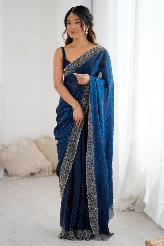 Ilanova Teal Blue Satin Embellished Ready to Wear SareeTeal Blue Satin Embellished Ready to Wear Saree