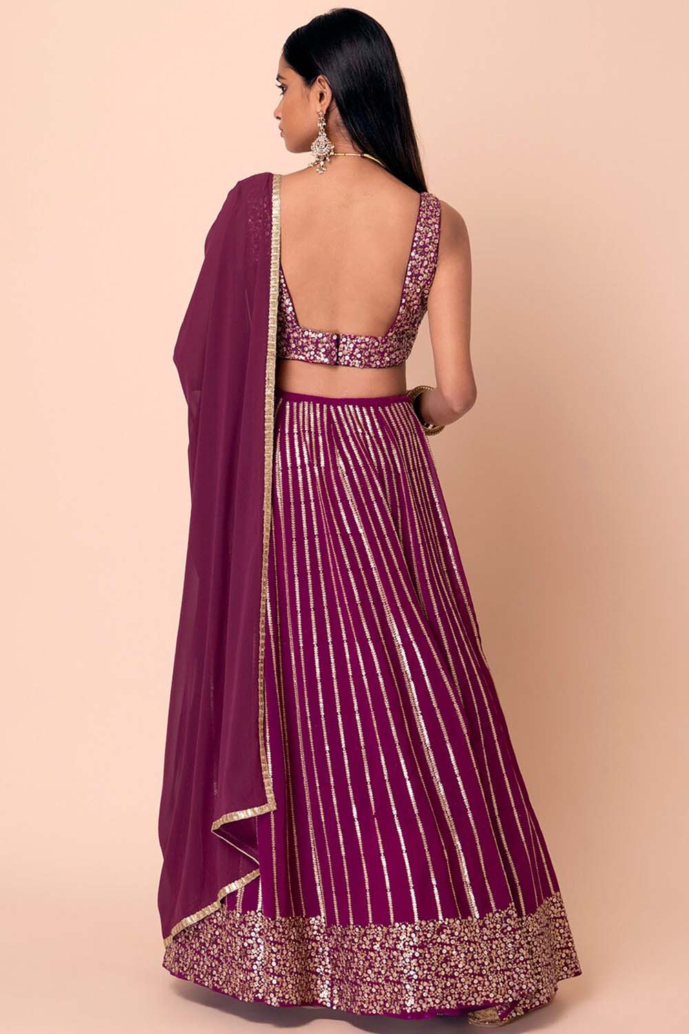 Raina Wine Georgette Sequins &amp; Gold Zari Embroidered Lehenga Saree