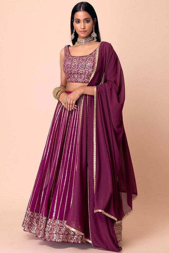 Raina Wine Georgette Sequins &amp; Gold Zari Embroidered Lehenga Saree