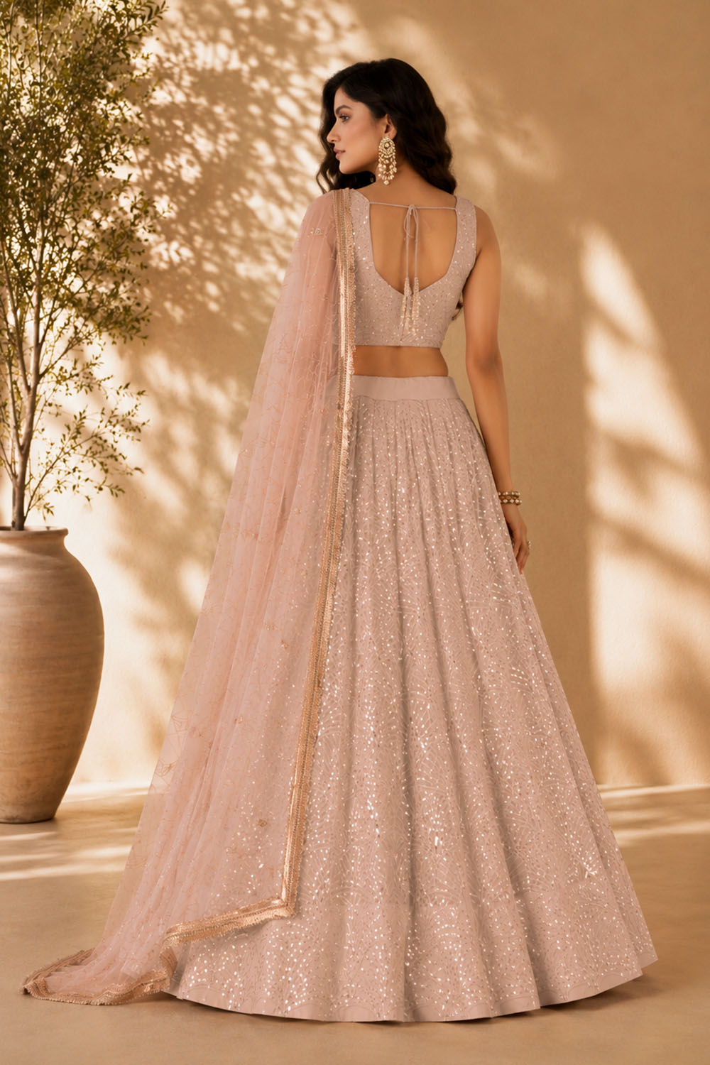 Priyanka Peach Net Thread & Sequins Embroidered Lehenga Saree