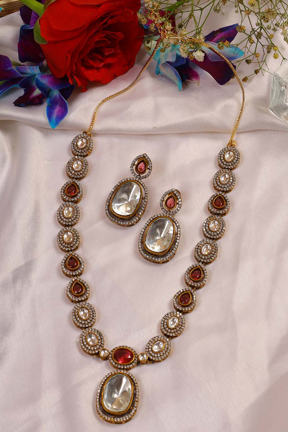 Raina Gold Plated Ruby Pink Moissanite Polki Necklace Set