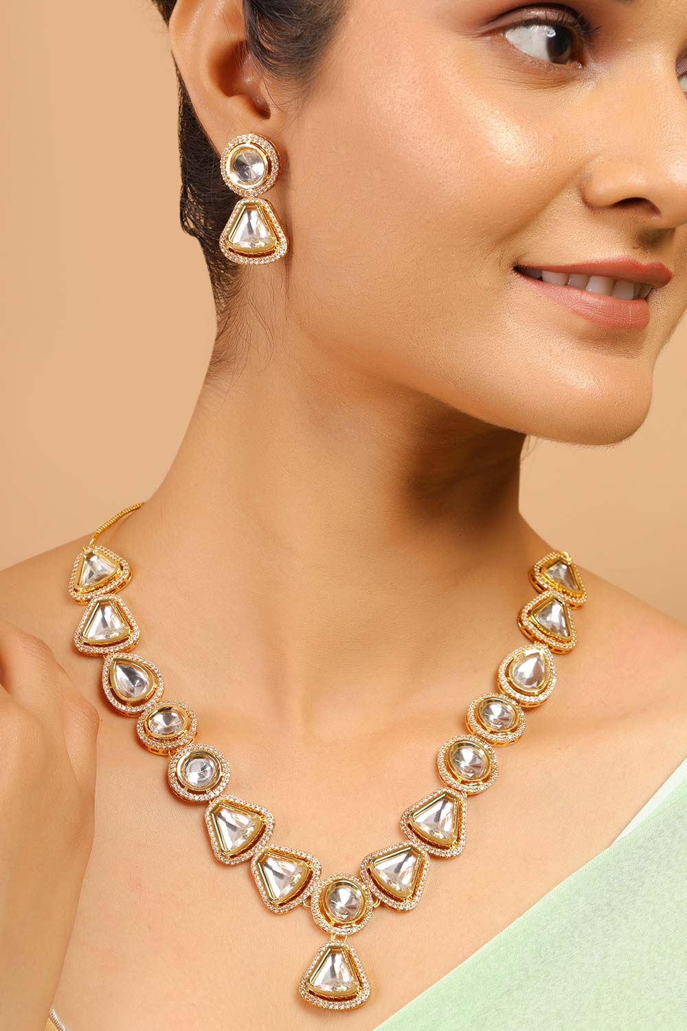 Payal Gold Toned Kundan Polki Necklace Set